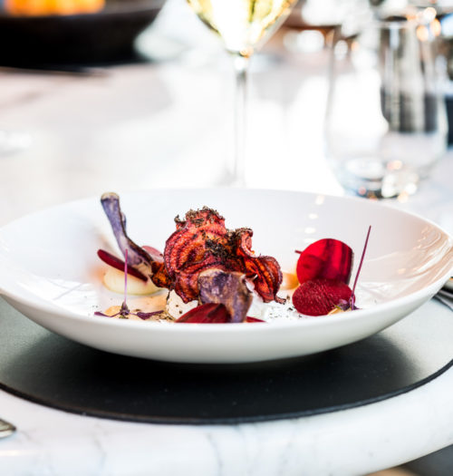 A white plate with grilled vegetables at Coperto Restobar in Zwolle