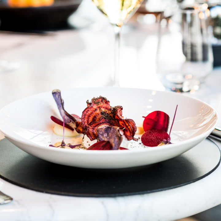 A white plate with grilled vegetables