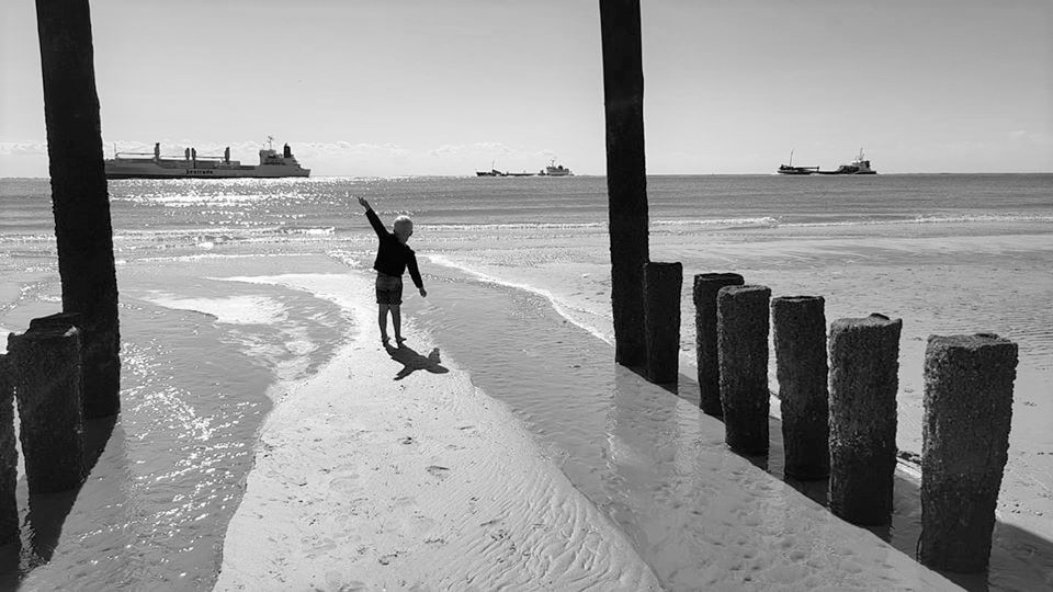 A small boy on the beach