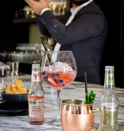 Gin Tonic and cocktails on a marble table at Coperto Restobar in Zwolle