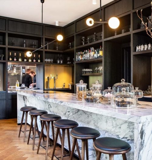 Marble bar with black cupboard at Coperto Restobar in Zwolle